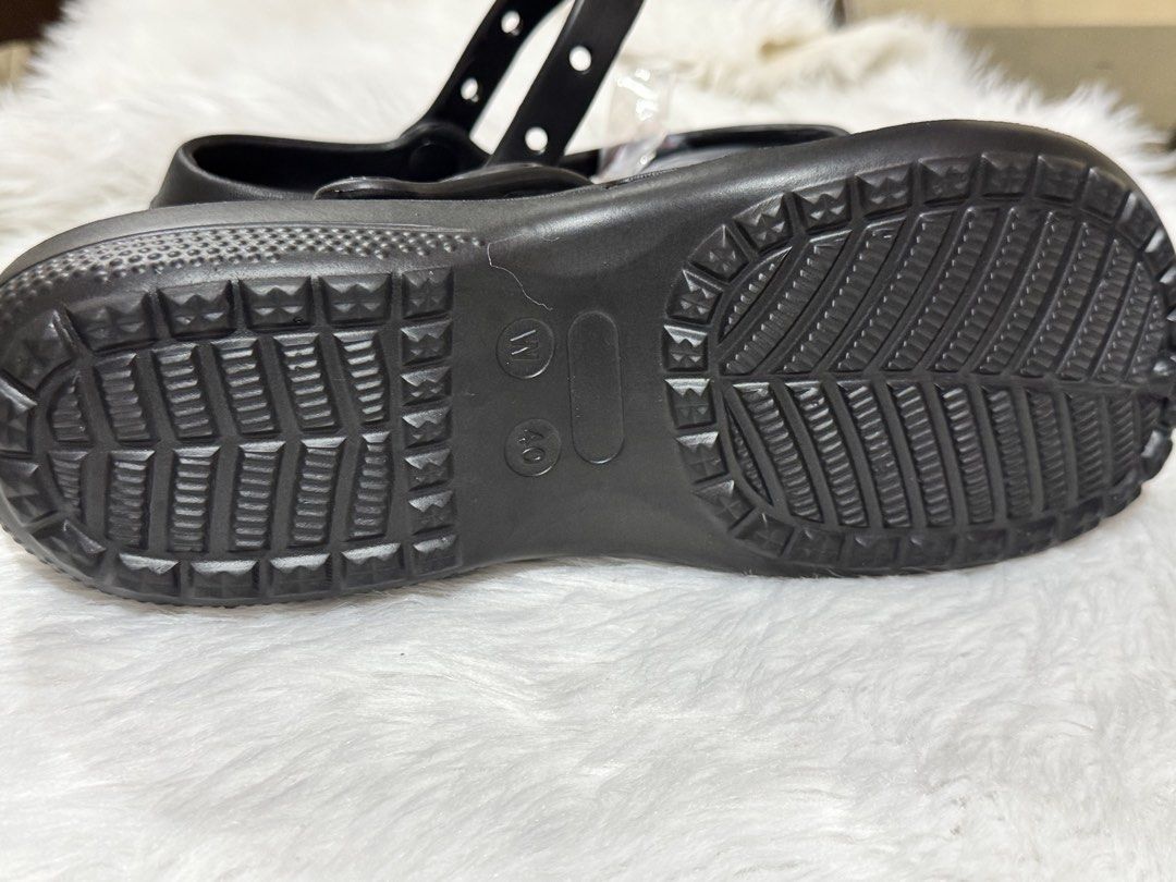 Black Crocs Mary Jane Style Sandals (Category: Flats & Sandals) located in Manila. Submitted by sariestore (Listing ID 1462069875, Image 3). Description: - RFS: Decluttering -Classic design in black - Features a secure Mary Jane strap (alike) - Easy slip-on and off for convenience - Ventilation holes for breathability - Durable sole with a grippy tread pattern - Perfect for everyday casual wear -No brand -Bought online wrong size Mode of payment: