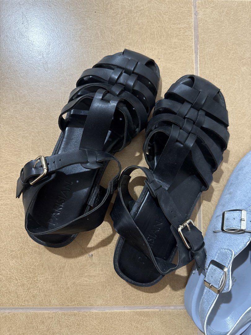 Black Gladiator Sandals & Light Blue Suede Clogs (Category: Flats & Sandals) located in Bulacan. Submitted by maggui (Listing ID 1462224693, Image 2). Description: - Black Parisian Fisherman sandals with buckle straps. - Blue rusoles suede clogs Selling as bundle 250 each.