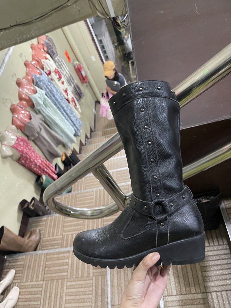 Black Leather Studded Mid-Calf Boots (Category: Boots) located in Balanga. Submitted by crowjo (Listing ID 1462197217, Image 1). Description: - Black leather boots - Stud details around ankle and top - Mid-calf height - Buckle strap detail at ankle - Sturdy sole - Size 38 - Great for everyday wear.