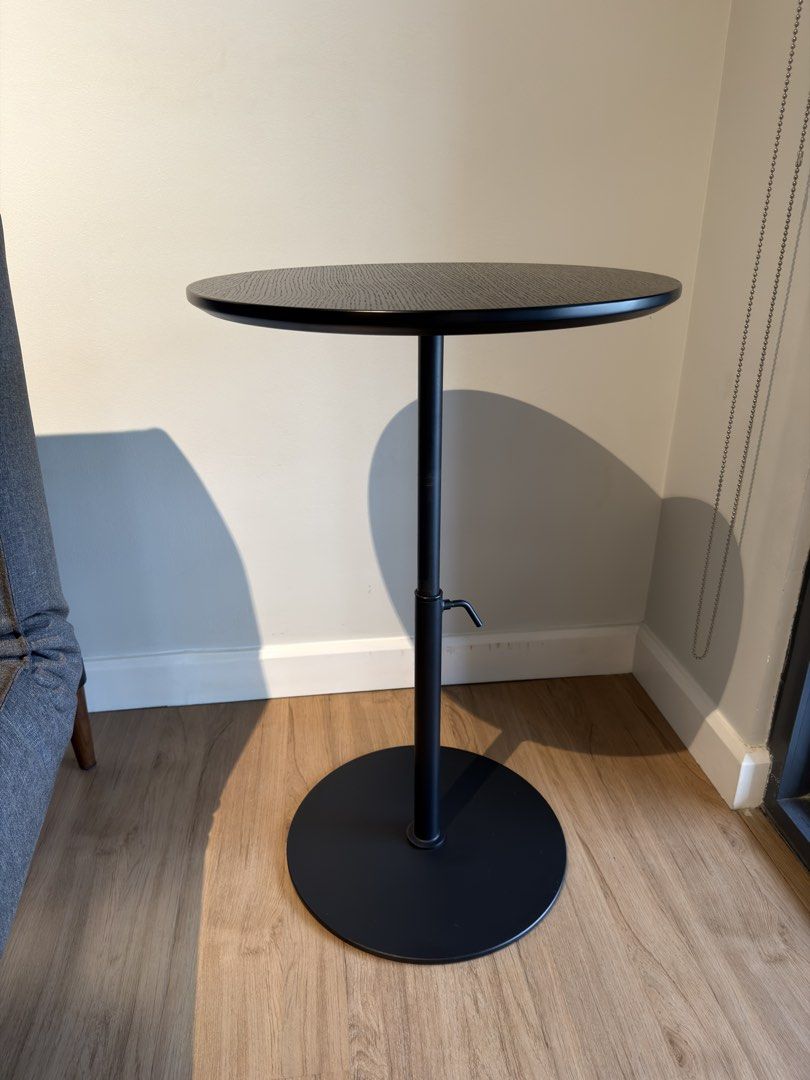 Black Round Adjustable Height Side Table (Category: Tables & Sets) located in Makati City. Submitted by maiemacale (Listing ID 1462161325, Image 2). Description: - Black round side table with adjustable height - Ideal for use next to a sofa or as a bedside table. - Dimensions: 70x45x45 cm highest setting, 41x45x45 cm lowest setting - Condition: Like New Original price: Php15,160 Selling price: Php10,000.