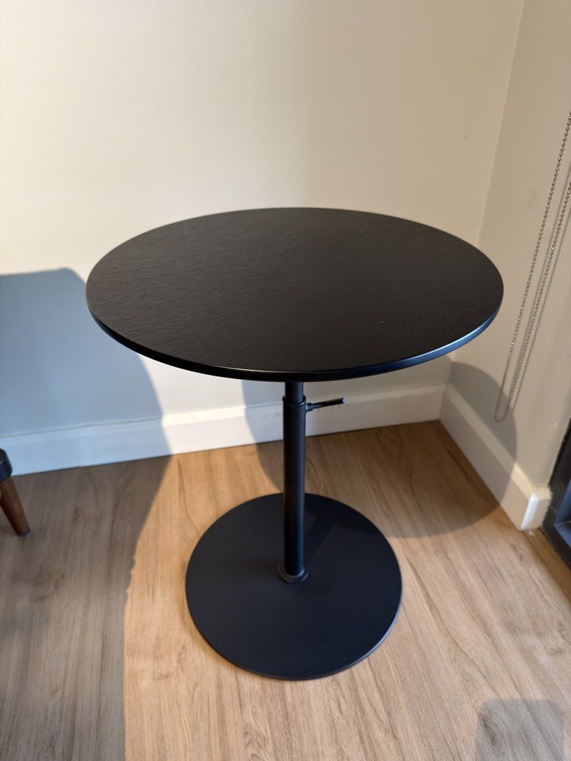 Black Round Adjustable Height Side Table (Category: Tables & Sets) located in Makati City. Submitted by maiemacale (Listing ID 1462161325, Image 3). Description: - Black round side table with adjustable height - Ideal for use next to a sofa or as a bedside table. - Dimensions: 70x45x45 cm highest setting, 41x45x45 cm lowest setting - Condition: Like New Original price: Php15,160 Selling price: Php10,000.