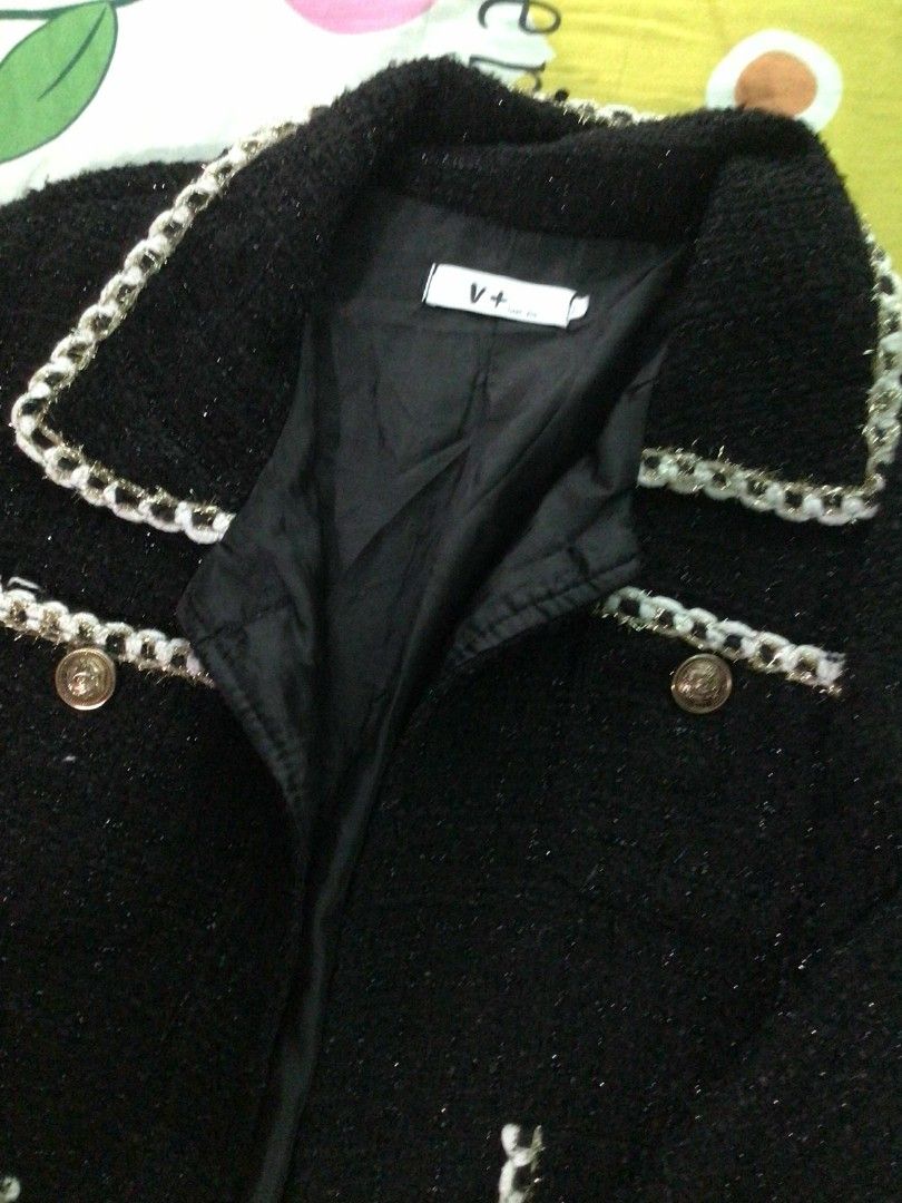 Black Tweed Jacket (Category: Coats, Jackets and Outerwear) located in General Trias. Submitted by dunht (Listing ID 1462115971, Image 3). Description: - Stylish black tweed jacket - Elegant white and gold chain trim - Gold button and pocket details - Fully lined for comfort - Perfect for dressing up or down 23 by 24, color rate 10/10.