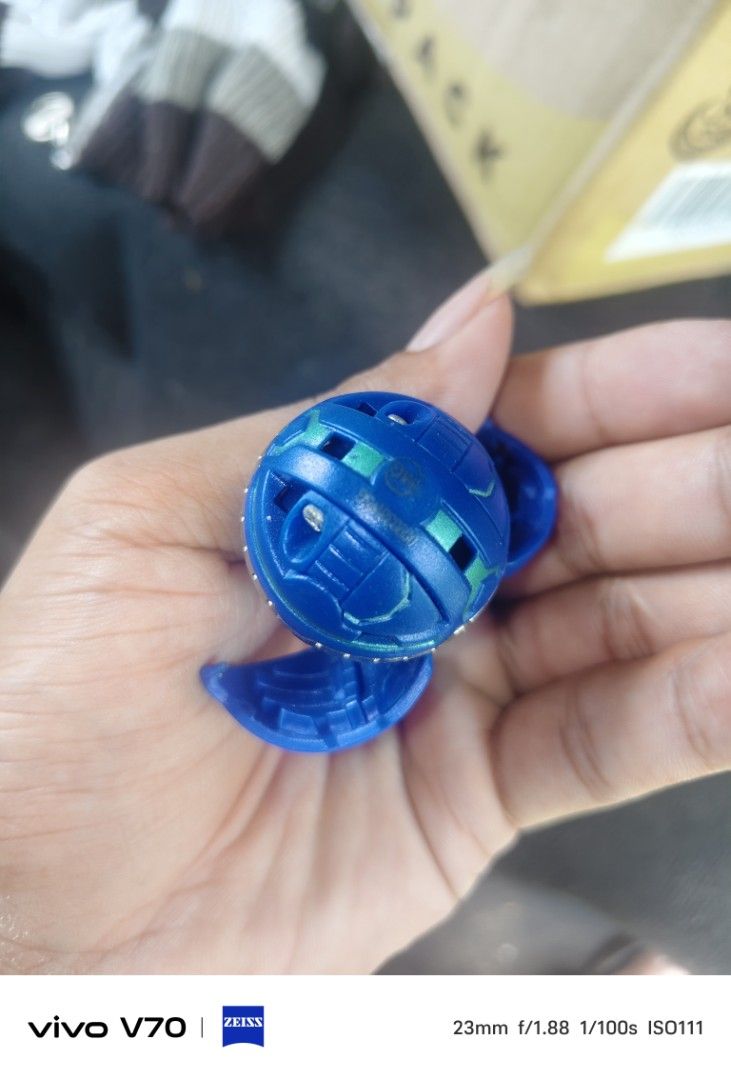 Blue Bakugan Toy (Category: Action & Battle Toys) located in Kapangan. Submitted by ClumZyDale (Listing ID 1462061743, Image 3). Description: - Blue Bakugan toy - Transforms from sphere to creature - Great for playing - Shows minor scuffs from play - Still transforms well - Fun for kids.