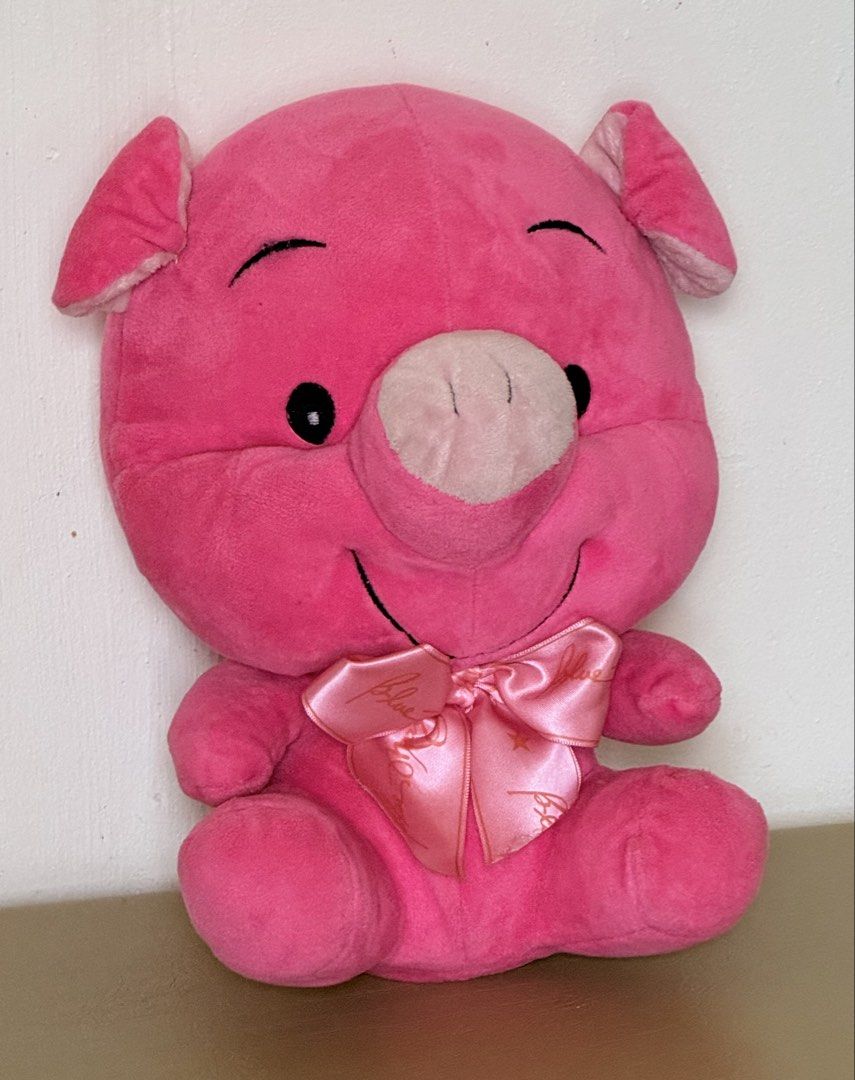 Blue Magic Pink Pig Plush Toy with Bow (Category: Plushies & Soft Toys) located in Dagupan City. Submitted by shopaholic_sungit (Listing ID 1462082059, Image 1). Description: Adorable pink pig plush toy Authentic Blue Magic product Buyer will pay for the Shipping Fee.