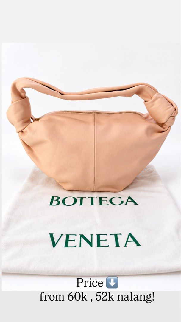 Bottega Veneta Double Tied (Category: Luxury Bags & Wallets) located in Batangas. Submitted by jereeemie (Listing ID 1462102186, Image 1). Description: BRANDNEW - Bottega Veneta Double tied bag 100 authentic with certificate of authenticity and dustbag only - Color: Nude/Peach - Material: Soft Leather - Features: Signature knotted handle, Zipper closure - Includes: Dust bag - Price: ₱52,000 (Reduced from ₱60,000)k.