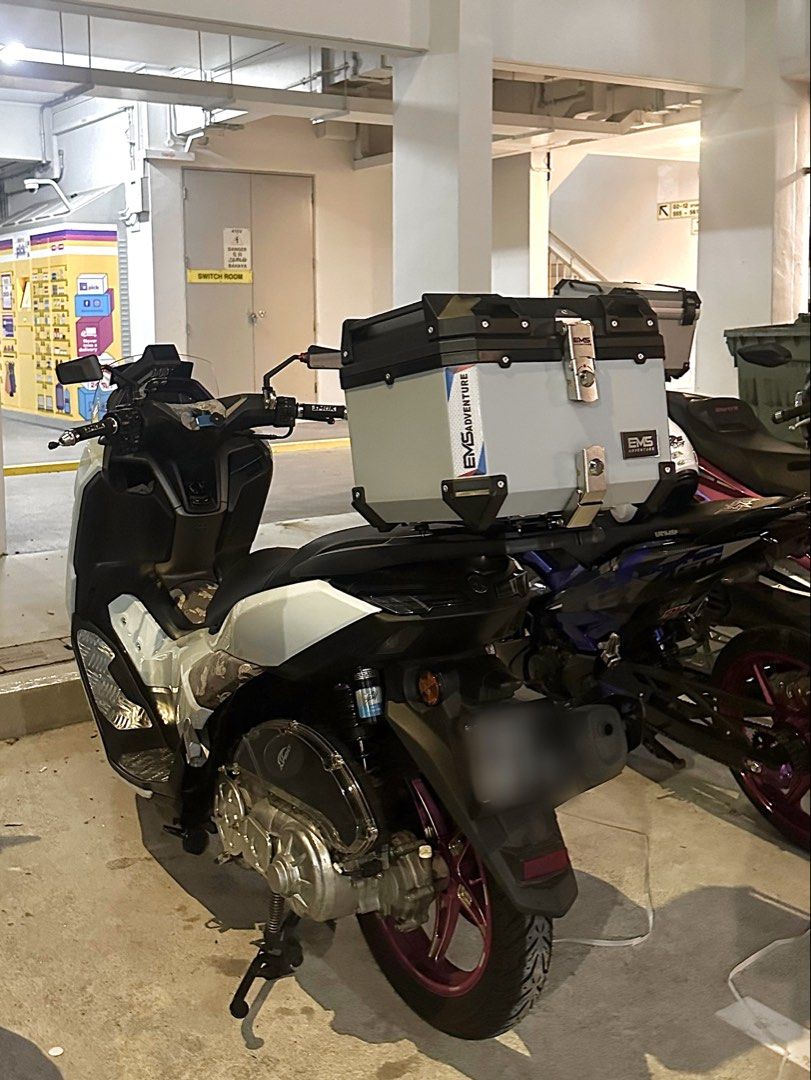Box (Category: Motorcycle Accessories) located in Singapore. Submitted by KemBunny (Listing ID 1462086355, Image 3). Description: - Brand new !! Cheap and easy to install 👍🏽 - 45l High Quality ABS Plastic , Grey with black top / double lock - I accidentally order 2 so i use one and had this extra . So dont worry it is 100% good condition - suitable with any bike no worries - also come with base plate & screw set - also come with cushion for inn