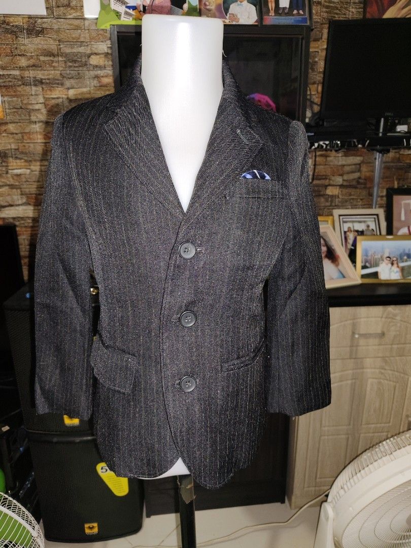 Boys Pinstripe Suit Jacket for Formal Occasions (Category: Babies & Kids Fashion) located in Manila. Submitted by duffy-080 (Listing ID 1462064436, Image 2). Description: - Dark pinstripe suit jacket for boys - Classic lapel design - Three-button front closure - Two front pockets and one chest pocket - Ideal for parties, weddings, and formal occasions - Creates a sharp and smart look -12inch bust -17 inch length .