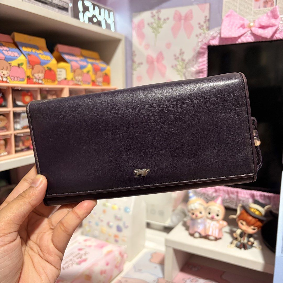 Braun Buffel Long Bifold Wallet (Category: Wallets & Card holders) located in Quezon City. Submitted by alxndriatlngbn (Listing ID 1462048362, Image 1). Description: Braun Büffel Long Wallet Original & genuine leather. Pre-loved, good condition with minimal signs of use. No box/tags, wallet only. RFS: Decluttering.
