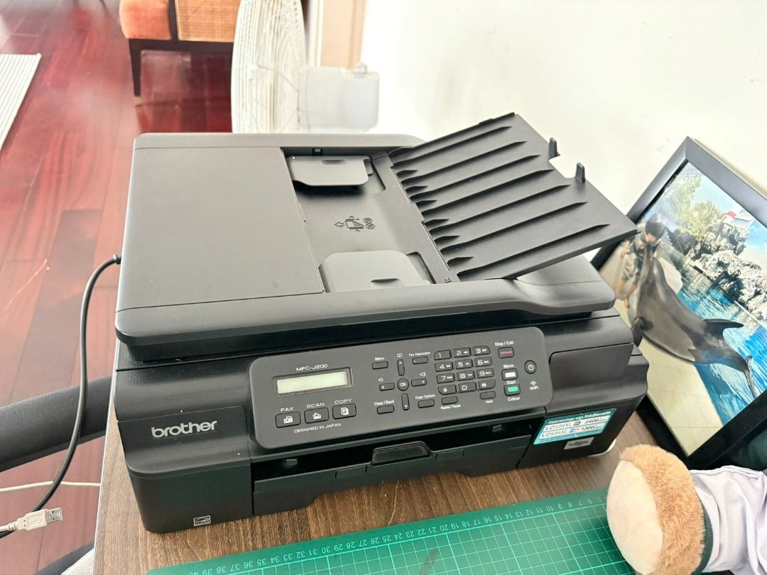 Brother MFC-J200 4-in-1 (Category: Printers, Scanners & Copiers) located in Makati City. Submitted by gnolore (Listing ID 1462061431, Image 1). Description: Selling my second-hand Brother MFC-J200 InkBenefit All-in-One Printer. Highly reliable and cost-efficient for home use, student assignments, or small offices! Key Features: - 4-in-1 Functionality: Print, Scan, Xerox/Copy, and Fax - Wireless Capability: Connect and print directly via Wi-Fi fro