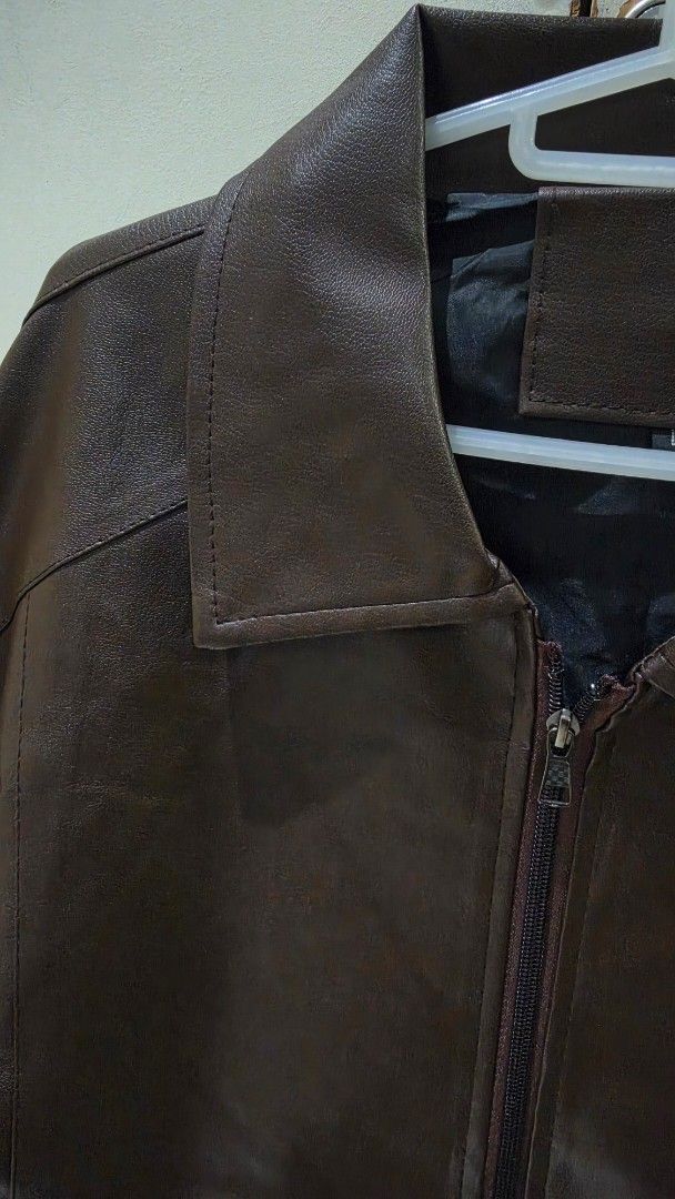 Brown Faux Leather Jacket (Category: Coats, Jackets and Outerwear) located in Quezon City. Submitted by luckycat_ddf3f0 (Listing ID 1462134941, Image 2). Description: - Classic brown faux leather jacket - Zip-up front - Two side pockets - Simple collar design - Perfect for casual wear or layering - Ideal for cooler weather -size Large.