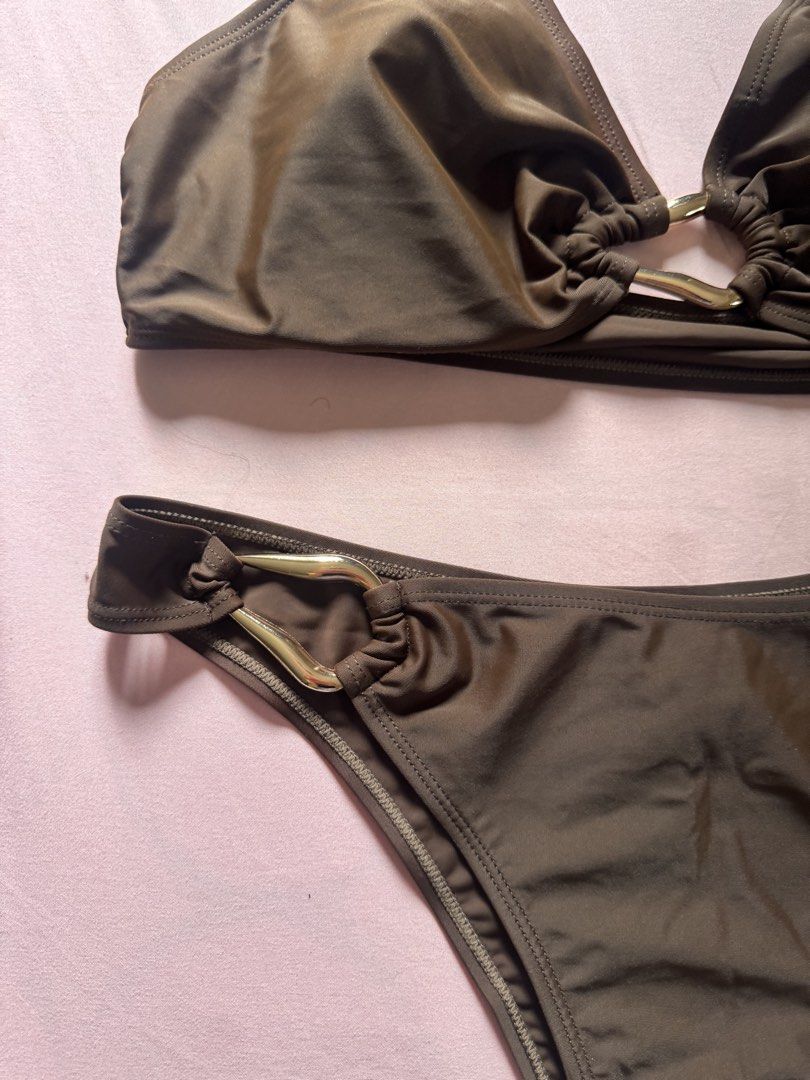 Brown Halter Bikini with Gold Ring Details (Category: Bikinis & Swimsuits) located in Paranaque City. Submitted by simplylizzy (Listing ID 1462099939, Image 2). Description: 👙 brand new rfs: not my size ✅ As described and shown in photos. Please review all photos and the description. Feel free to ask for more photos or details, happy to send. All sales are final..