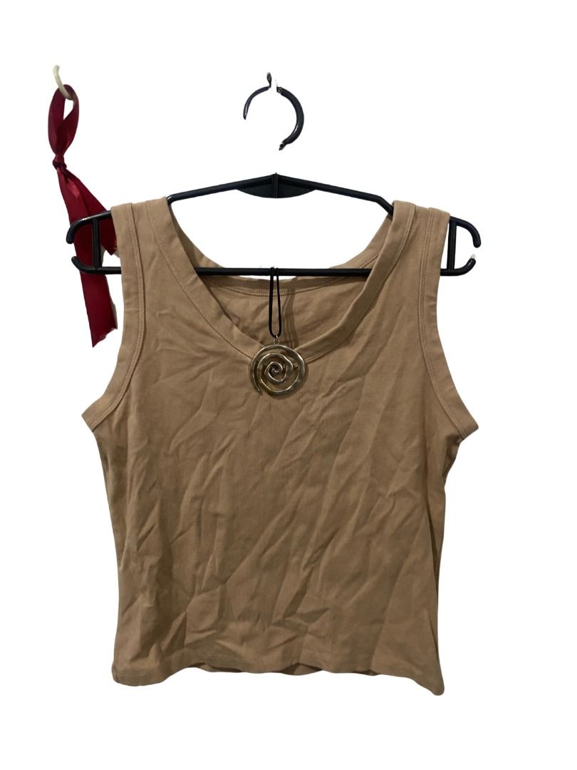 brown tank top (Category: Sleeveless) located in Quezon City. Submitted by kastiel00 (Listing ID 1462207227, Image 1). Description: .