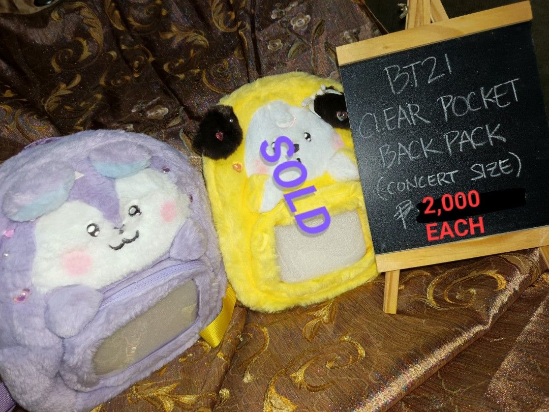 BT21 Clear Pocket Plush Backpack Concert Size (Category: Travel Essentials & Accessories) located in Manila. Submitted by cypherchepark (Listing ID 1462233837, Image 1). Description: From 2,000.00 SALE to 1,800.00 only 💜 - Super cute and fluffy BT21 clear pocket backpacks - Perfect for concerts or everyday use - Concert size - Available in purple and yellow - Get yours now!.
