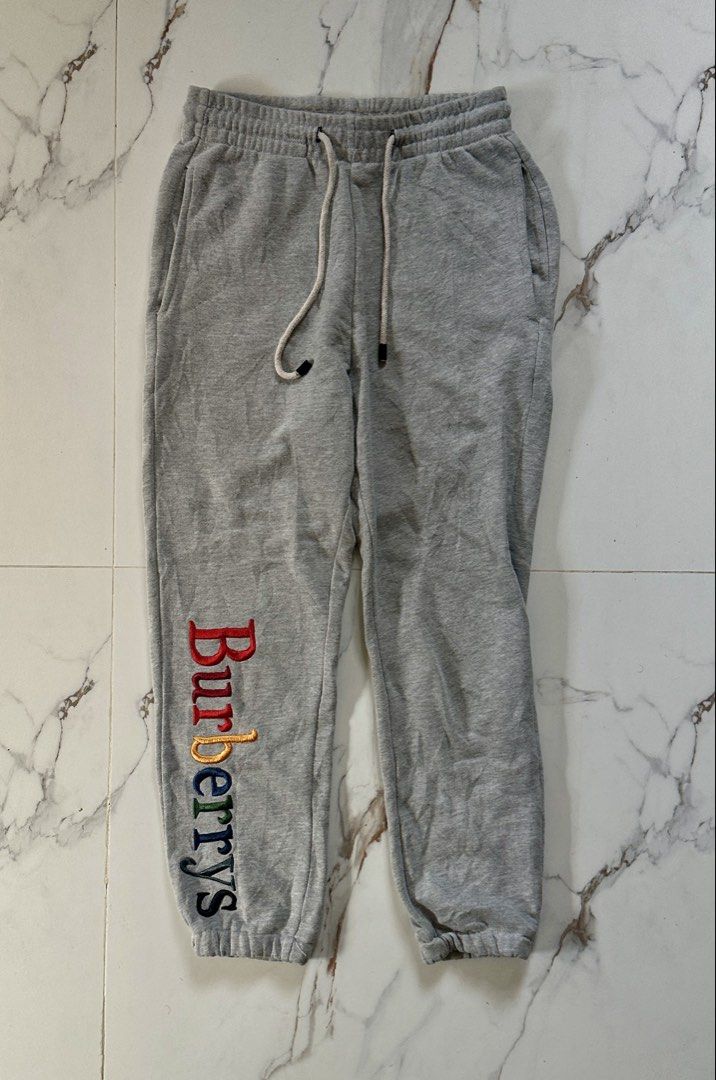 Burberry Brit Grey Sweatpants Rainbow Logo Size S (Category: Joggers) located in Candaba. Submitted by shokgold19 (Listing ID 1462102020, Image 1). Description: - Burberry Brit Grey Sweatpants - Iconic rainbow logo embroidered on left leg - Elastic waistband with drawstring - Made in Turkey - Size S - Ideal for casual wear.