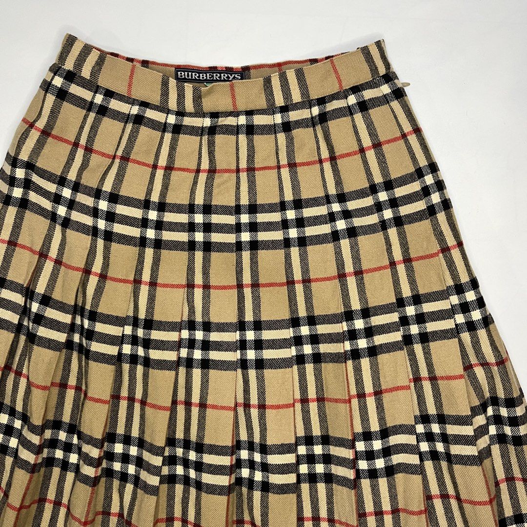 BURBERRY PLEATED WOOL SKIRT (Category: Luxury Apparel) located in Bacolod City. Submitted by the.finest (Listing ID 1462237405, Image 2). Description: Vintage Burberry Nova check Plaid - Pleated Wool Skirt Waistline: 24-25 Length: 26.5 Condition: 9/10 5,000+shipping fee.