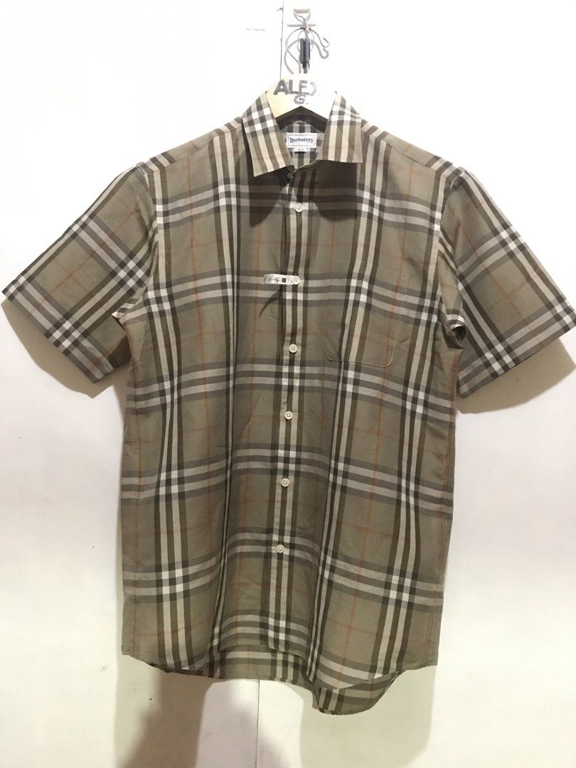 BURBERRYS nova check plaid botton down polo (Category: Luxury Apparel) located in Davao. Submitted by axelgalz (Listing ID 1462260940, Image 1). Description: BURBERRYS nova check botton down polo Authentic Japan realease Size on tag MA DIMES W21 L28 by inches Good as new No issues .