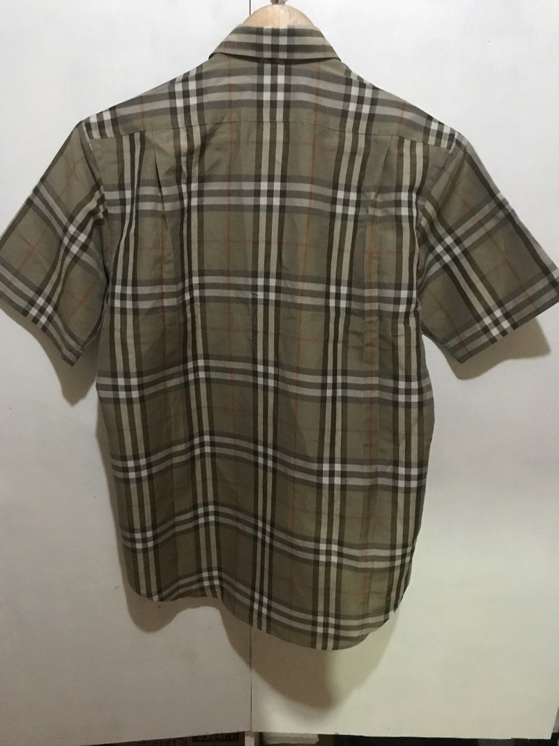 BURBERRYS nova check plaid botton down polo (Category: Luxury Apparel) located in Davao. Submitted by axelgalz (Listing ID 1462260940, Image 2). Description: BURBERRYS nova check botton down polo Authentic Japan realease Size on tag MA DIMES W21 L28 by inches Good as new No issues .