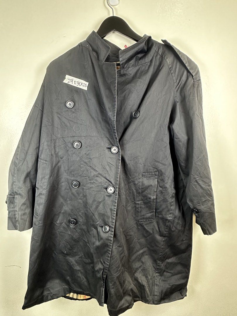 Burberrys Trench Coat Double Breasted Nova Check Lining (Category: Coats, Jackets and Outerwear) located in Manila. Submitted by declutterpromax (Listing ID 1462082946, Image 1). Description: - Classic Burberry trench coat - Double-breasted design with button closure - Iconic Nova Check lining - Perfect for layering - Timeless wardrobe essential - Sharp and stylish.