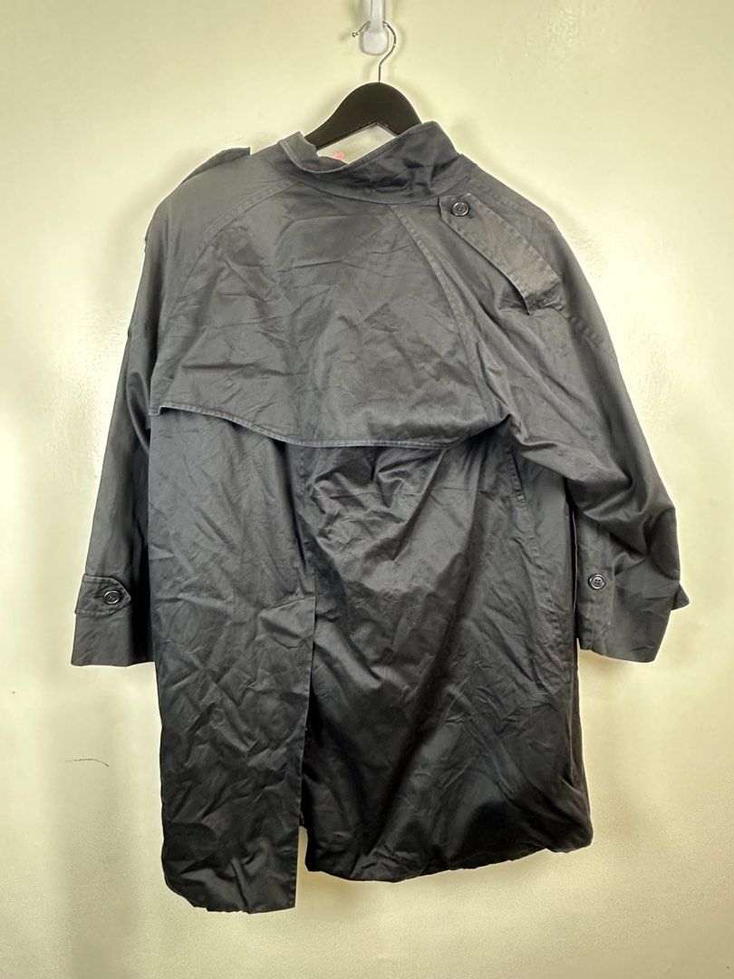 Burberrys Trench Coat Double Breasted Nova Check Lining (Category: Coats, Jackets and Outerwear) located in Manila. Submitted by declutterpromax (Listing ID 1462082946, Image 2). Description: - Classic Burberry trench coat - Double-breasted design with button closure - Iconic Nova Check lining - Perfect for layering - Timeless wardrobe essential - Sharp and stylish.