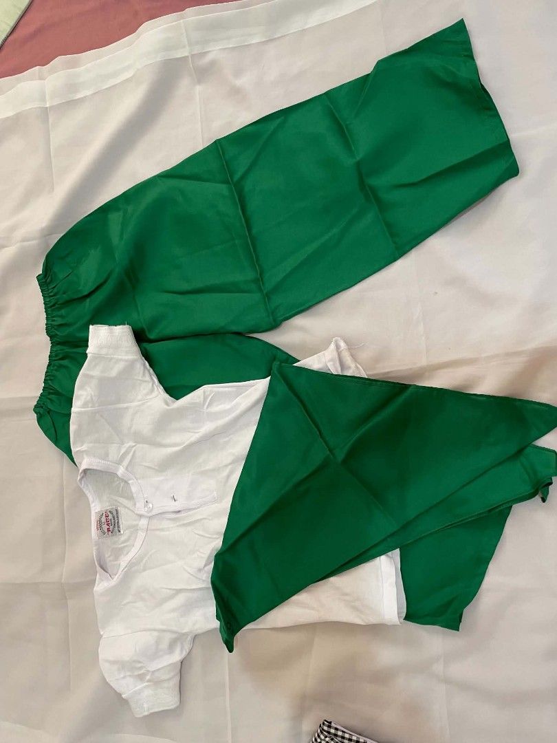 BUWAN NG WIKA COSTUME (Category: Babies & Kids Fashion) located in Makati City. Submitted by primadonna00 (Listing ID 1462261392, Image 2). Description: -BUWAN NG WIKA COSTUME - Complete Scout Uniform Set for Kids - Includes: White short-sleeved shirt (button closure), Green elastic waist pants, Green neckerchief - Ideal for scouting activities and events - Ready for adventure!.