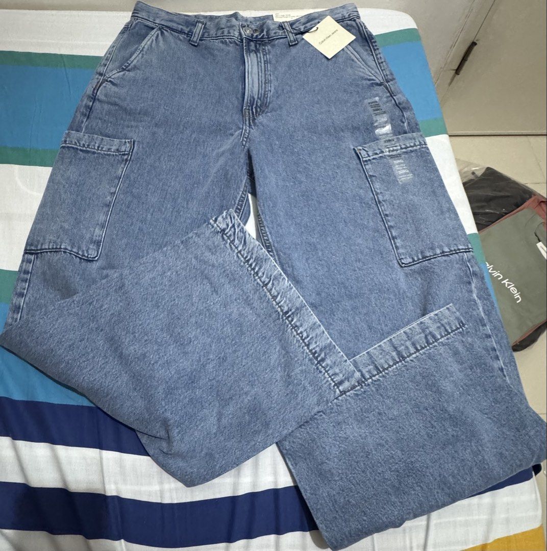 Calvin Klein Cargo Wide Leg Denim Pants (Category: Announcements) located in Quezon City. Submitted by branded_jo (Listing ID 1462050926, Image 2). Description: Original Calvin Klein Wide Leg Cargo Pants size 32 Light weight wash denim Brand new with tag Bought in Canada Lalamove ready.