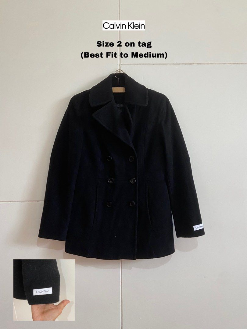 Calvin Klein Double Breasted Black Coat Size 2 (Category: Coats, Jackets and Outerwear) located in Manila. Submitted by alluuure (Listing ID 1462219394, Image 1). Description: Calvin Klein Black Double Breasted Peacoat Tag says 2, fits like a Medium .