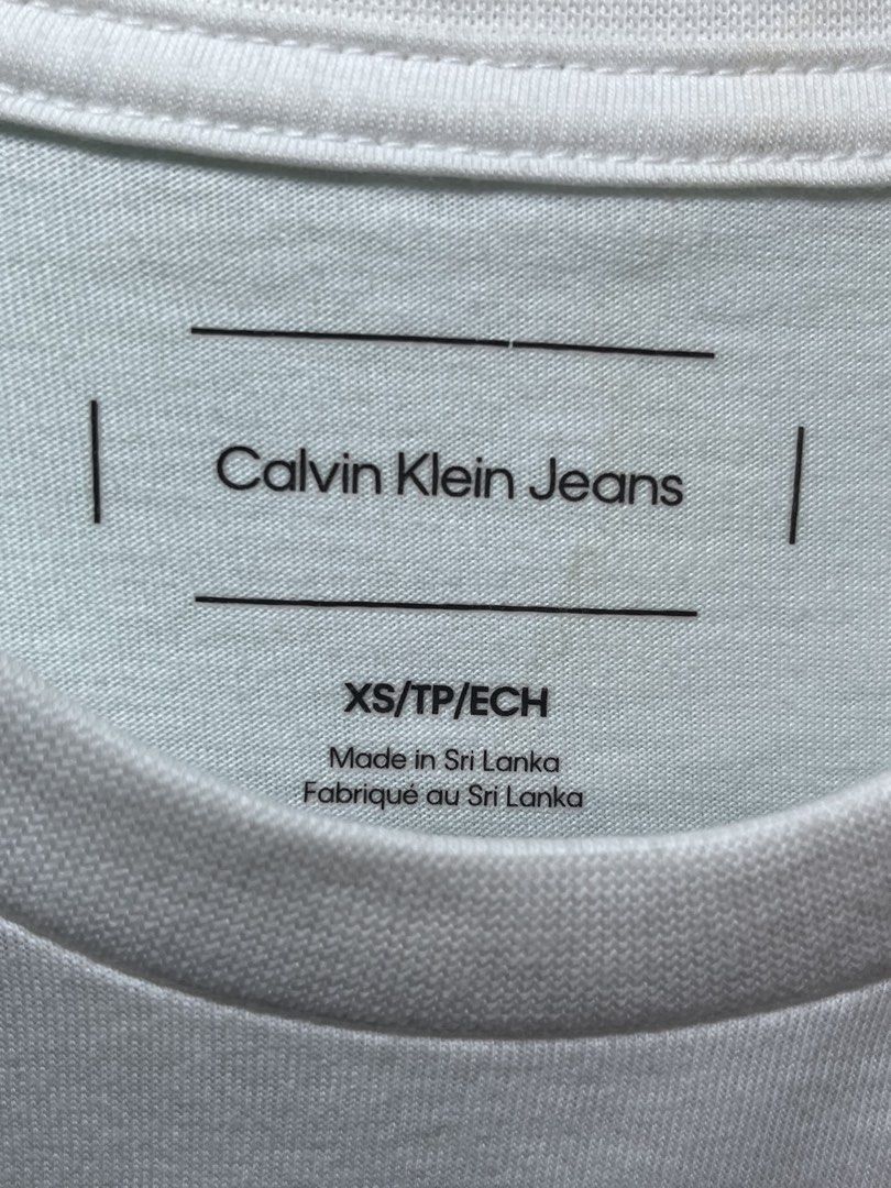 Calvin Klein Jeans T-Shirt White (Category: Tshirts & Polo Shirts ) located in Tacloban City. Submitted by renki-forshop (Listing ID 1462116521, Image 3). Description: RFS: Wrong size. Never wore. GOOD AS NEW. Delivery must be shouldered by buyer. PM me if you’re interested!.