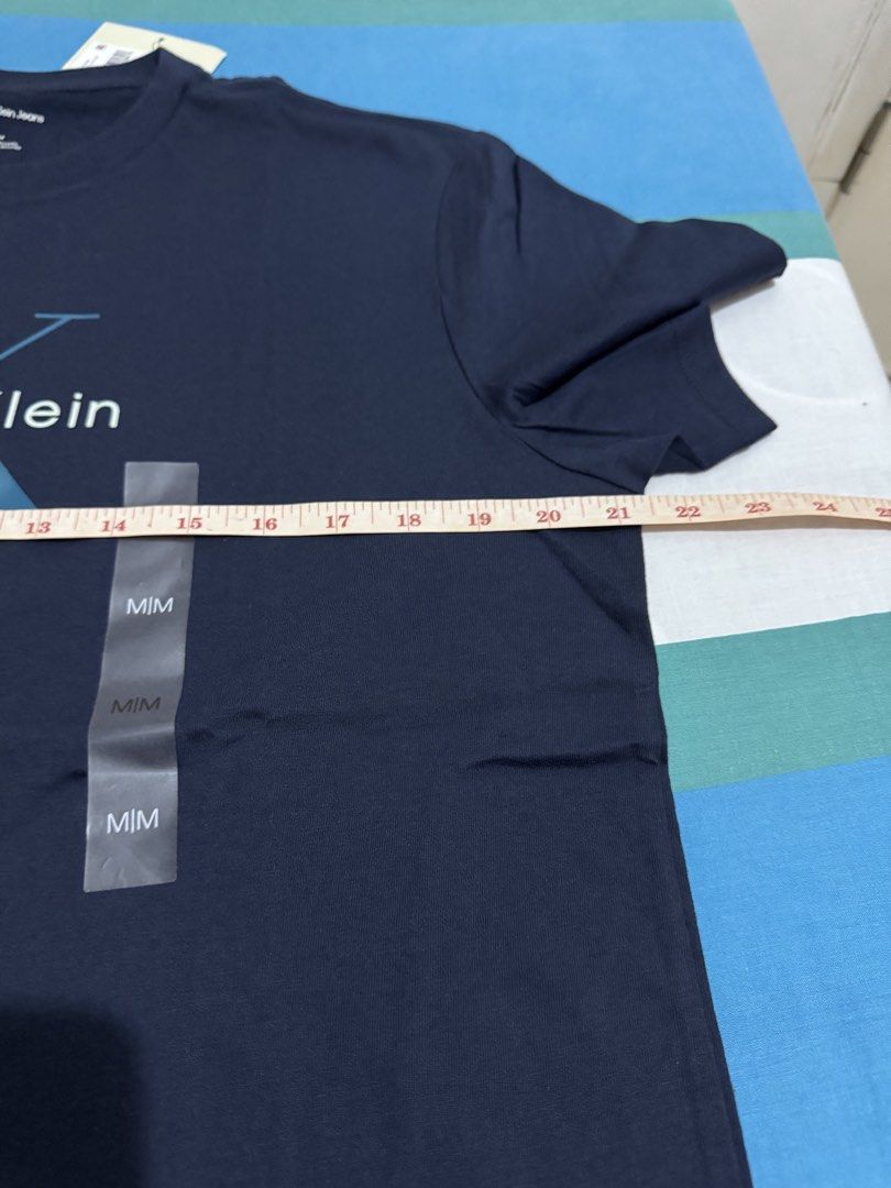Calvin Klein Men Shirt (Category: Announcements) located in Quezon City. Submitted by branded_jo (Listing ID 1462049727, Image 2). Description: Original Calvin Klein Men Shirt Med on tag Color Dark Blue Brand new with tag Bought in Canada Lalamove ready.
