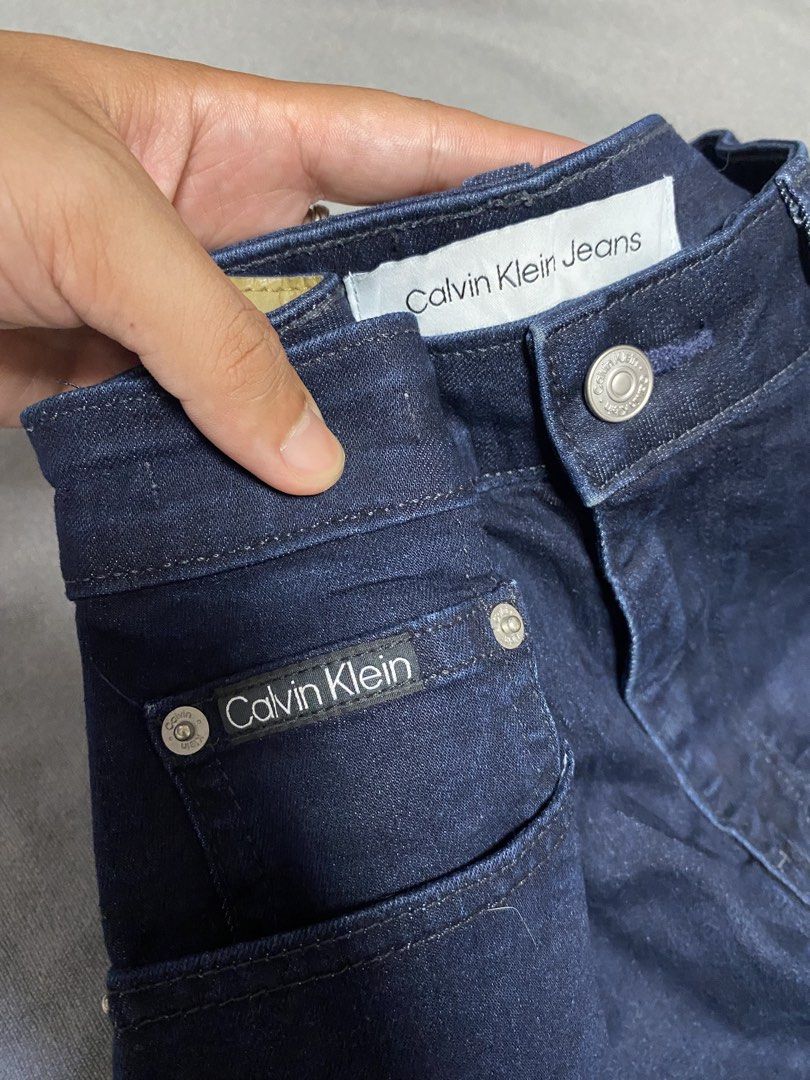 CALVIN KLEIN RAW DENIM PANTS (Category: Jeans) located in Cabuyao City. Submitted by ukaythriftshirt (Listing ID 1462134825, Image 2). Description: CALVIN KLEIN RAW DENIM PANTS GOOD AS NEW WAIST 32 LENGTH 38.5 COLOR RATE 9.5/10 NO ISSUE - 750.