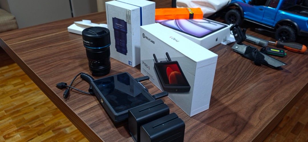 Camera Gear (Category: Other Accessories) located in Manila. Submitted by aint.aika (Listing ID 1462053400, Image 1). Description: For Sale: (Prices still Included) ~ Fujifilm Sirui 50mm F1.8 Anamorphic Lense (38,000 pesos) ~ Hollyland Pyro 5 Wireless Transceiving Monitor (21,500 pesos) ~ SmallRig NP-F970 Battery and Charger kit (4,000 pesos) **58,500 pesos if take everything !Reason for Sale: Not needed and barely used, just opened !Inclusions: 