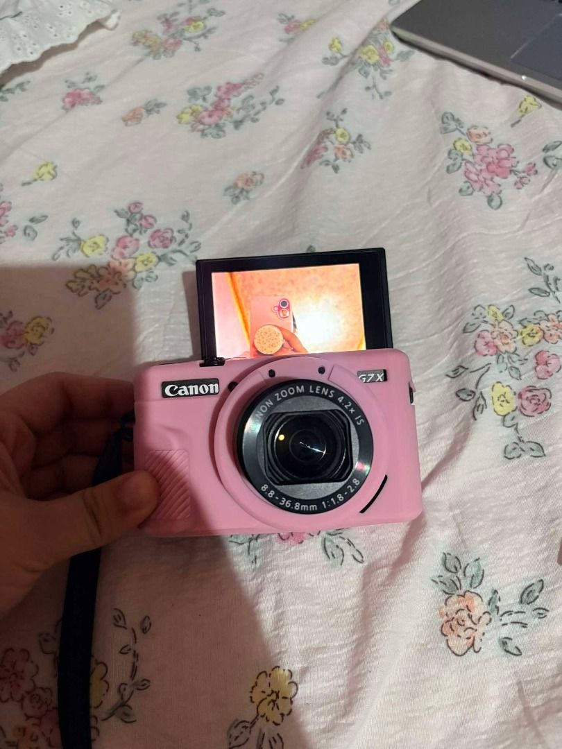 Canon G7X Mark II (Category: Cameras) located in Santo Tomas. Submitted by hillsm.cat (Listing ID 1462106352, Image 2). Description: Canon G7X Mark II, Lady-owned and in pristine condition Fully functional Body condition: 10/10 Issues: No Issues, all buttons are working Price: 48,000, slightly negotiable Inclusions: • Camera unit • Original battery • Camera strap • Original charger • Original box • Manuals RFS: Need funds.