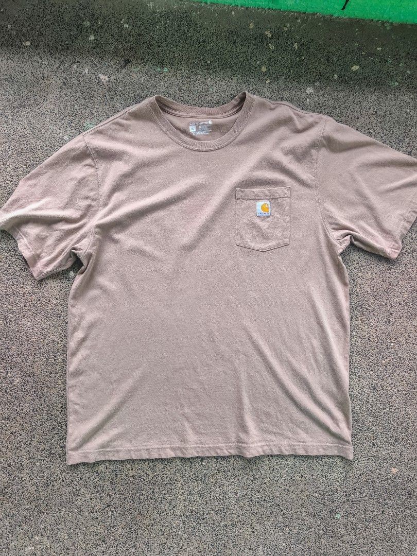 Carhartt k87 desert XL (authentic) (Category: Tshirts & Polo Shirts ) located in La Trinidad. Submitted by lookingforpalm (Listing ID 1462216578, Image 1). Description: Style: K87 Loose Fit Heavyweight Pocket Tee Color: Desert (DES) Size: Men's XL (Loose Fit runs spacious) Material: 100% Cotton Condition: Pre-owned, excellent condition with light natural wear and no major flaws. 26x32.5.