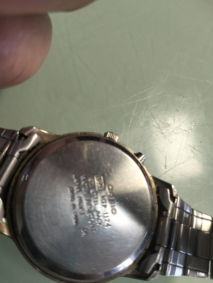 Casio Illuminator Water Resist Watch (Category: Men's Watches) located in General Mariano Alvarez. Submitted by ma.miafajardo1219 (Listing ID 1462053389, Image 2). Description: Casio watch with Illuminator and Water Resist features. Silver metal strap. The watch face is white with clear numbers. Some signs of wear on the metal strap and casing. Price tag shows 1200.sale now for only 1000.