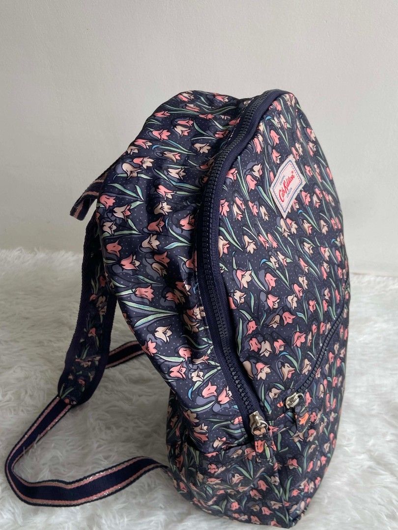 Cath Kidston Backpack Navy Floral Print (Category: Backpacks) located in Bulacan. Submitted by bella.ken.varietystore (Listing ID 1462183109, Image 2). Description: Cute Cath Kidston backpack. Features a navy blue base with a pretty floral print all over. Has two zip compartments. Adjustable straps for comfort. Great for daily use or travel. Plenty of space inside..