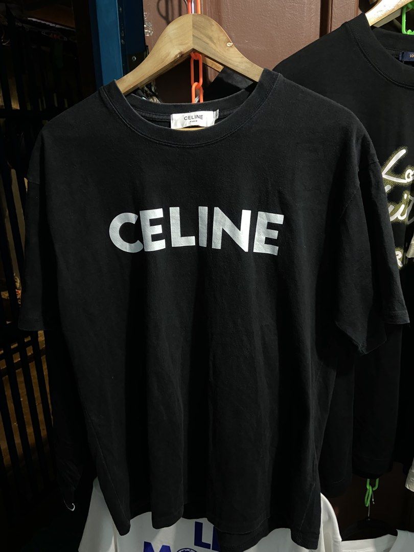 CELINE PARIS Black T-Shirt Size L (Category: Shirts) located in Manila. Submitted by kentjohnz. (Listing ID 1462150299, Image 1). Description: - Classic Black Celine Paris T-shirt - Simple and timeless design - Made from 100% premium cotton - Tagged as size L - Ideal for everyday comfort and style 28x21.