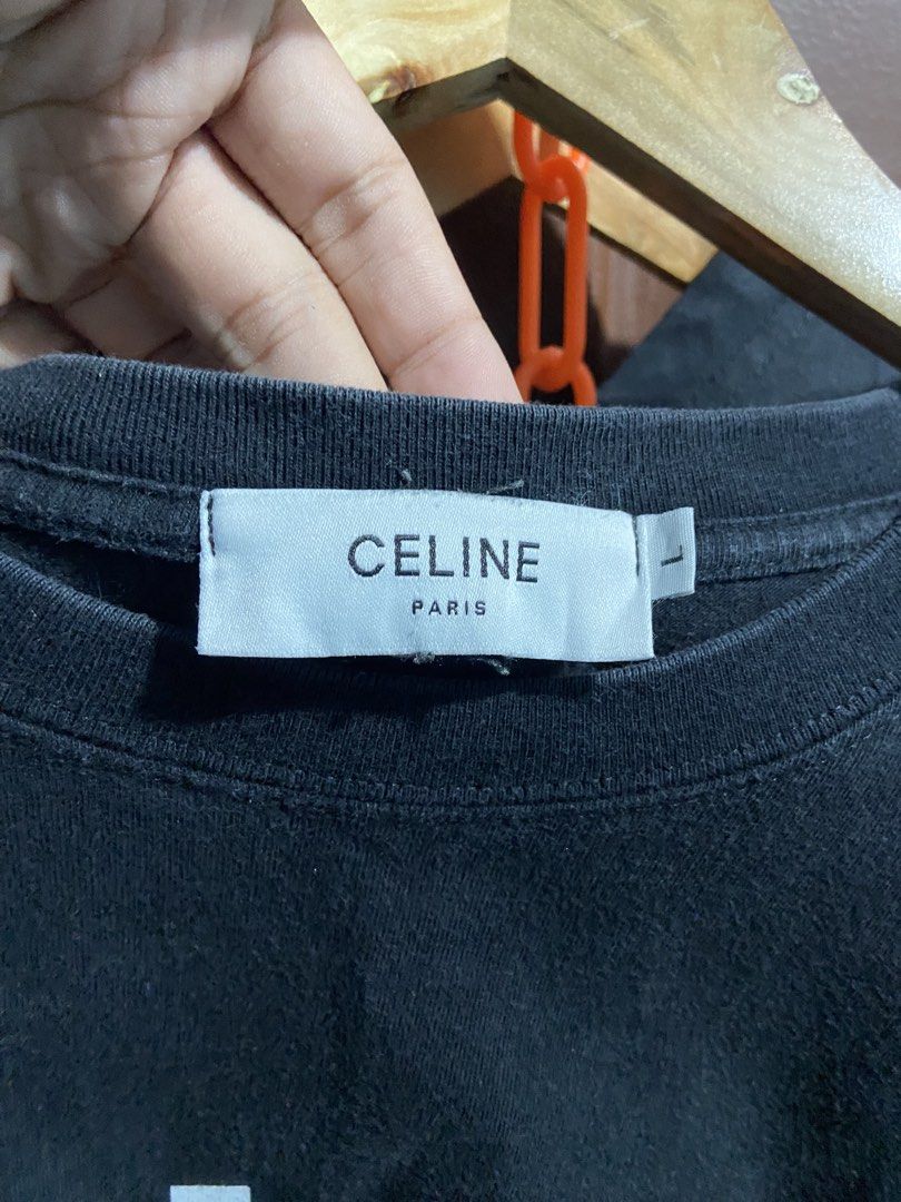 CELINE PARIS Black T-Shirt Size L (Category: Shirts) located in Manila. Submitted by kentjohnz. (Listing ID 1462150299, Image 2). Description: - Classic Black Celine Paris T-shirt - Simple and timeless design - Made from 100% premium cotton - Tagged as size L - Ideal for everyday comfort and style 28x21.