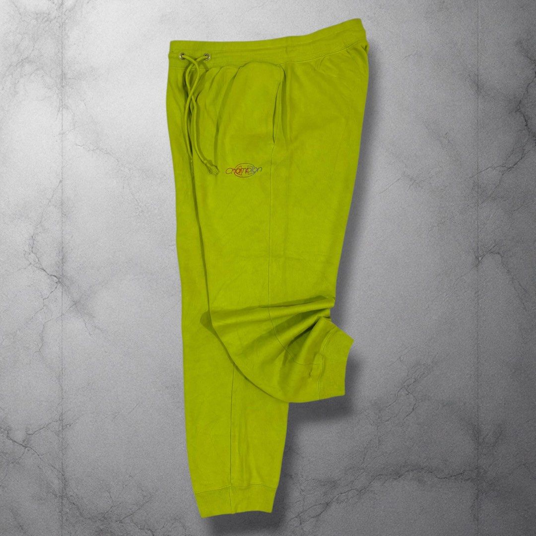 Champion Green Sweatpants Joggers (Category: Joggers) located in Cavite. Submitted by itsayaaa (Listing ID 1462078978, Image 1). Description: - Bright green Champion sweatpants - Elastic waistband with drawstring - Two side pockets - Ribbed cuffs at the ankles - Ideal for lounging or casual wear - Comfortable and stylish.