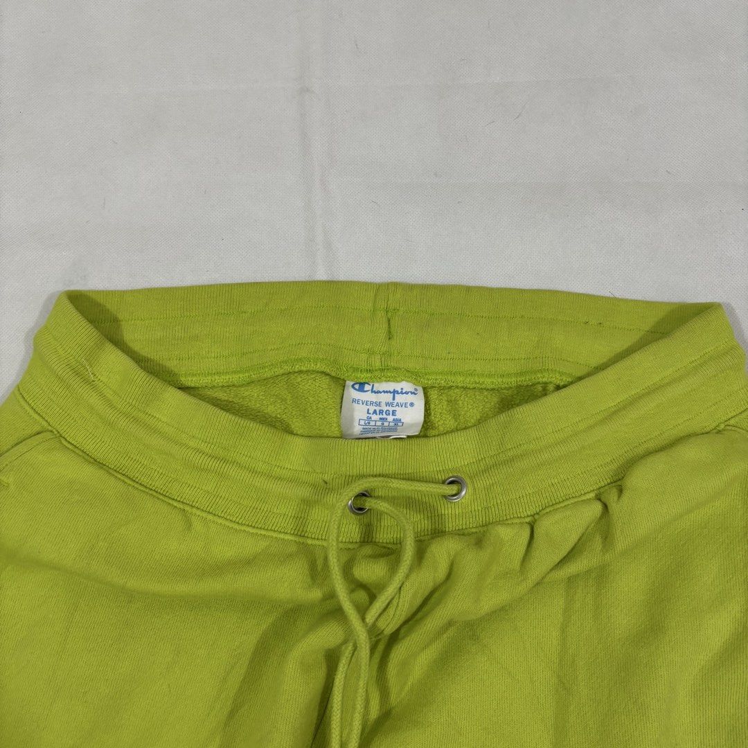 Champion Green Sweatpants Joggers (Category: Joggers) located in Cavite. Submitted by itsayaaa (Listing ID 1462078978, Image 3). Description: - Bright green Champion sweatpants - Elastic waistband with drawstring - Two side pockets - Ribbed cuffs at the ankles - Ideal for lounging or casual wear - Comfortable and stylish.