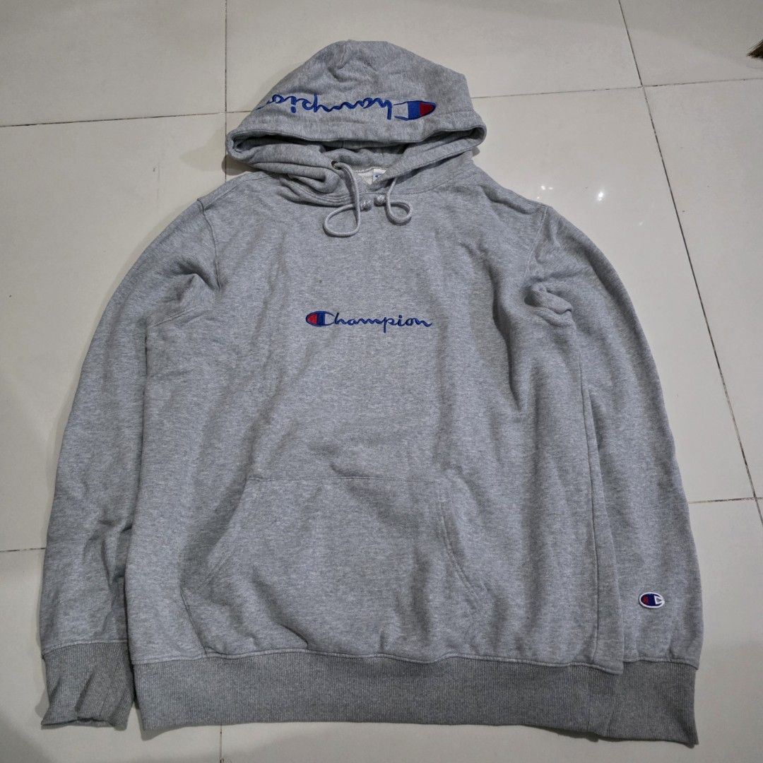 Champion Grey Hoodie Sweatshirt (Category: Coats, Jackets and Outerwear) located in Quezon City. Submitted by kick_mnl (Listing ID 1462185787, Image 1). Description: - Classic grey Champion hoodie - Embroidered Champion logo on chest and sleeve - Adjustable drawstring hood - Convenient front pocket - Made from a soft and comfortable cotton blend - Ideal for everyday casual style.