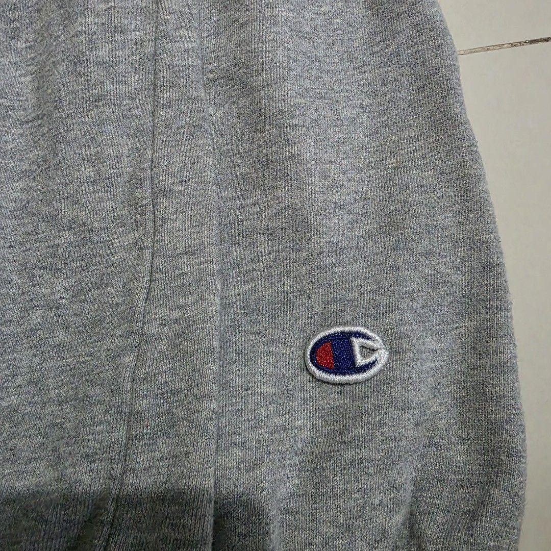 Champion Grey Hoodie Sweatshirt (Category: Coats, Jackets and Outerwear) located in Quezon City. Submitted by kick_mnl (Listing ID 1462185787, Image 3). Description: - Classic grey Champion hoodie - Embroidered Champion logo on chest and sleeve - Adjustable drawstring hood - Convenient front pocket - Made from a soft and comfortable cotton blend - Ideal for everyday casual style.