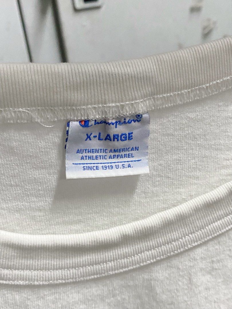 Champion White T-Shirt X-Large (Category: Tshirts & Polo Shirts ) located in Manila. Submitted by shesdecluttering_0 (Listing ID 1462212572, Image 3). Description: - classic white Champion t-shirt - features iconic C logo on chest and sleeve -good as new metro manila.