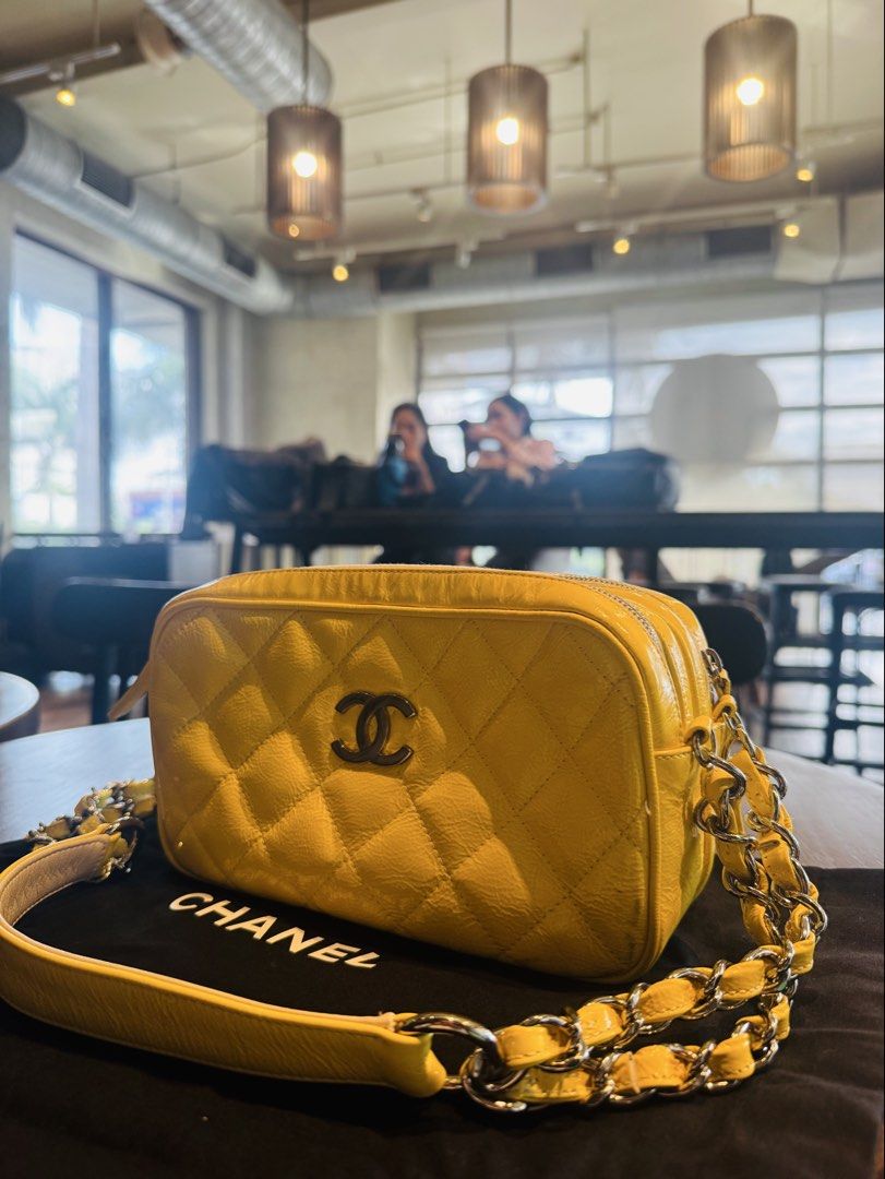 Chanel Yellow Quilted Leather Camera Bag (Category: Luxury Bags & Wallets) located in Marilao. Submitted by cj458678 (Listing ID 1462208789, Image 2). Description: - Authentic Yellow Chanel Camera Bag - Quilted Leather with Silver Hardware - Signature Chain Strap Detail - Comes with Original Dust Bag - Versatile for Everyday or Special Occasions - Adds a vibrant pop of color to any outfit - open for layaway no additional interest .