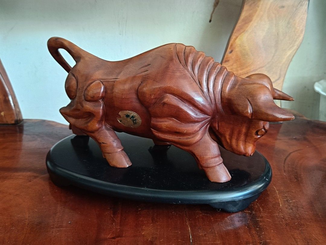 Charging Bull Wooden Statue (Category: Figurines & Statues) located in Imus. Submitted by ABrielleC (Listing ID 1462109774, Image 2). Description: Video Link https://youtube.com/shorts/tLt4oOgtniY?si=QVyP_6Ox_aWkLxlH Wood Material Plastic Base Height-5.75in Length-11.5in Width-4in Weight-0.75kg Japan Surplus Item First to pay Loc Imus Cavite.