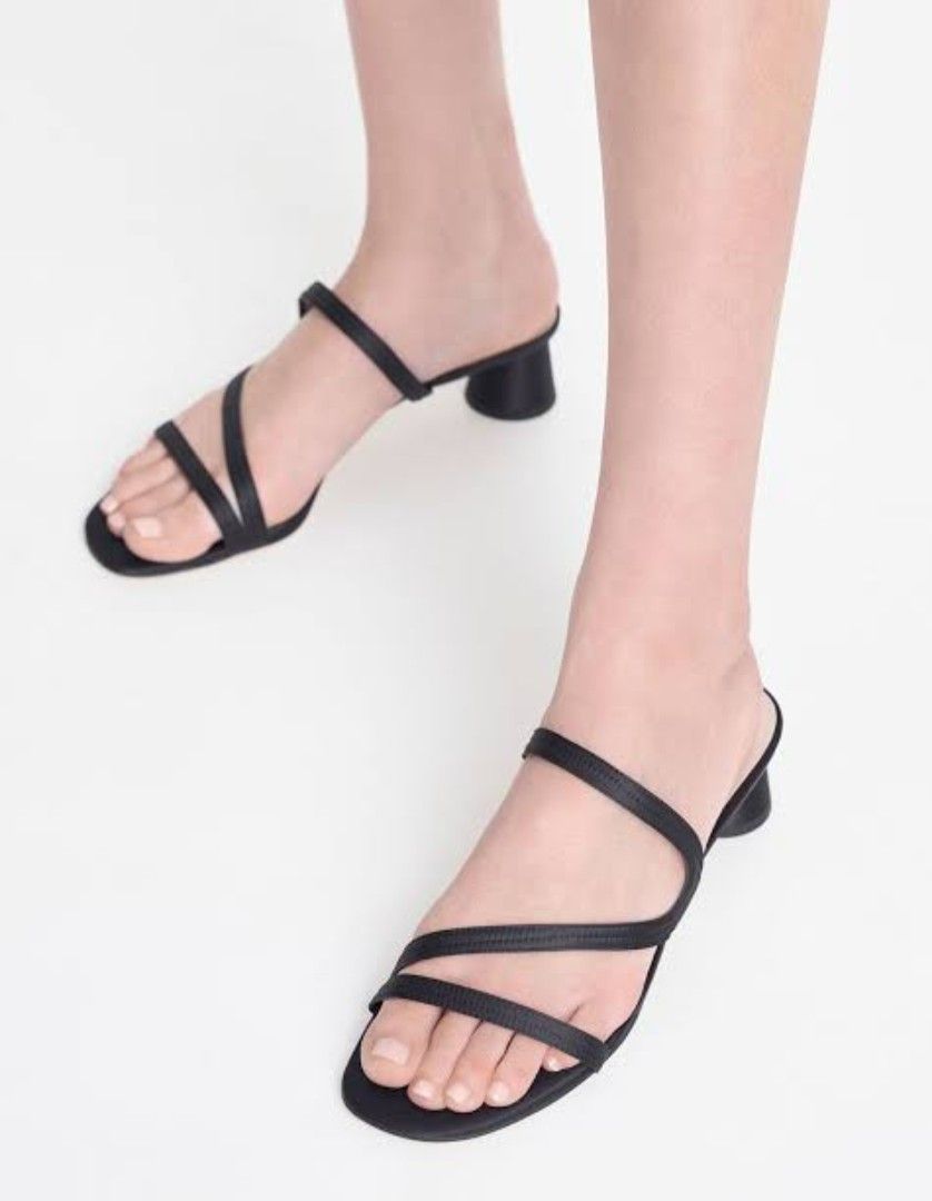 [Charles & Keith] Arden Satin Wavy Strap Mules (Size 37) (Category: Heels) located in Makati City. Submitted by skyioh (Listing ID 1455219939, Image 1). Description: No box / used once - Brand: Charles & Keith - Color: Black - Material: Satin with PU lining - Style: Strappy block heels - Size: 37 📌Location : Makati 📌Payment : Gcash 📌Shipping : on Buyer. You may book grab/lalamove etc.