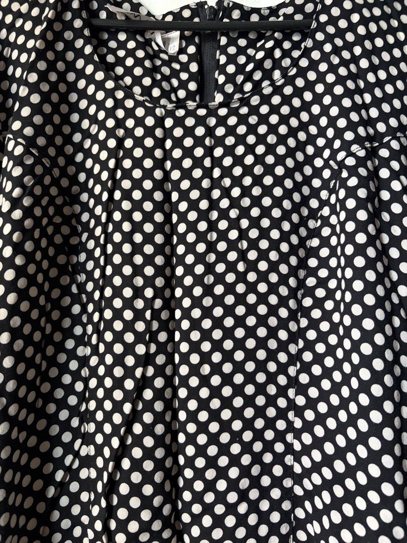 Chic Polka Dot Viscose Dress (Category: Dresses) located in Las Pinas. Submitted by bibliomomma (Listing ID 1462096760, Image 2). Description: Cue Australia Size 12 Elegant black viscose dress with a classic white polka dot print. Features long sleeves, round neckline, and a relaxed, flowy fit-comfortable and easy to style for both casual and dressy occasions When laid flat Pit to pit 18inches Length 33 inches MOP Gcash.