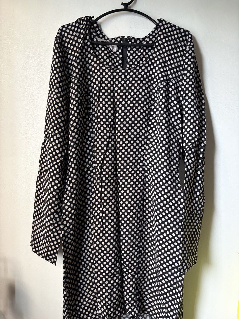 Chic Polka Dot Viscose Dress (Category: Dresses) located in Las Pinas. Submitted by bibliomomma (Listing ID 1462096760, Image 1). Description: Cue Australia Size 12 Elegant black viscose dress with a classic white polka dot print. Features long sleeves, round neckline, and a relaxed, flowy fit-comfortable and easy to style for both casual and dressy occasions When laid flat Pit to pit 18inches Length 33 inches MOP Gcash.