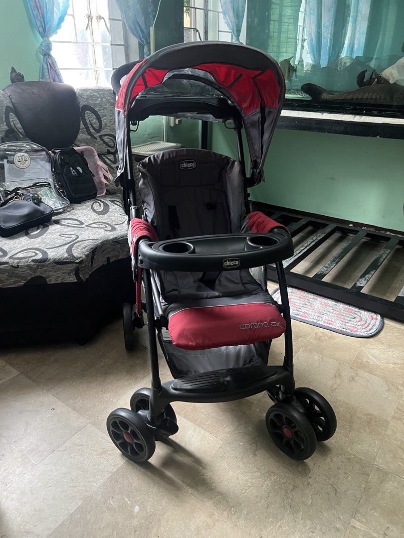 Chicco Cortina CX Stroller (Category: Strollers) located in Quezon City. Submitted by charlenedv58782 (Listing ID 1462115724, Image 1). Description: NEVER USED! Natambak lang Binili nung pandemic Hndi nagamit lumaki nalang yung bata and di nakapag travel See tires Minor gasgas lang because nilabas sa box and tinago sa storage Bought 29k with carseat but selling the stroller only. - Chicco Cortina CX stroller in stylish grey and red. - Convenient 