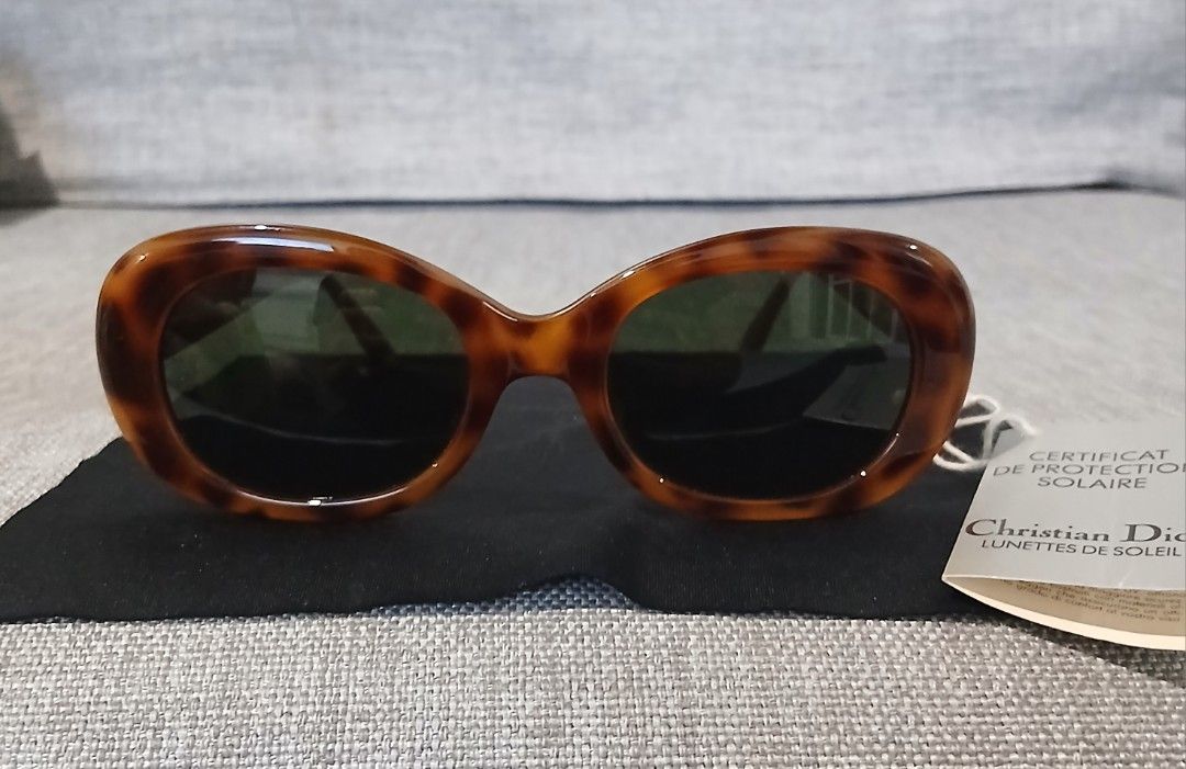 Christian Dior Tortoiseshell CD Logo Sunglasses (Category: Sunglasses & Eyewear) located in Alaminos. Submitted by sachiKaSan (Listing ID 1462076966, Image 1). Description: - Authentic Christian Dior sunglasses - Classic tortoiseshell pattern - Iconic CD logo on temples - Includes certificate of protection solaire and lunettes de soleil tag - Perfect statement accessory.
