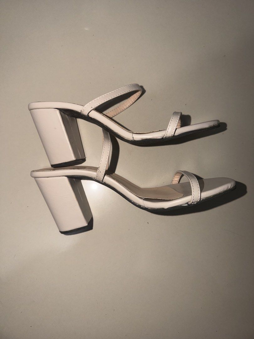City Walk White Block Heel Sandals (Category: Heels) located in San Jose. Submitted by mbp_123 (Listing ID 1462045330, Image 2). Description: -used once -excess glue on the sides from manufacturer - White block heel sandals from City Walk - Two thin straps across the foot - Open back with a heel strap - Chunky block heel style - Soles show some wear - Brand name printed on insoles.