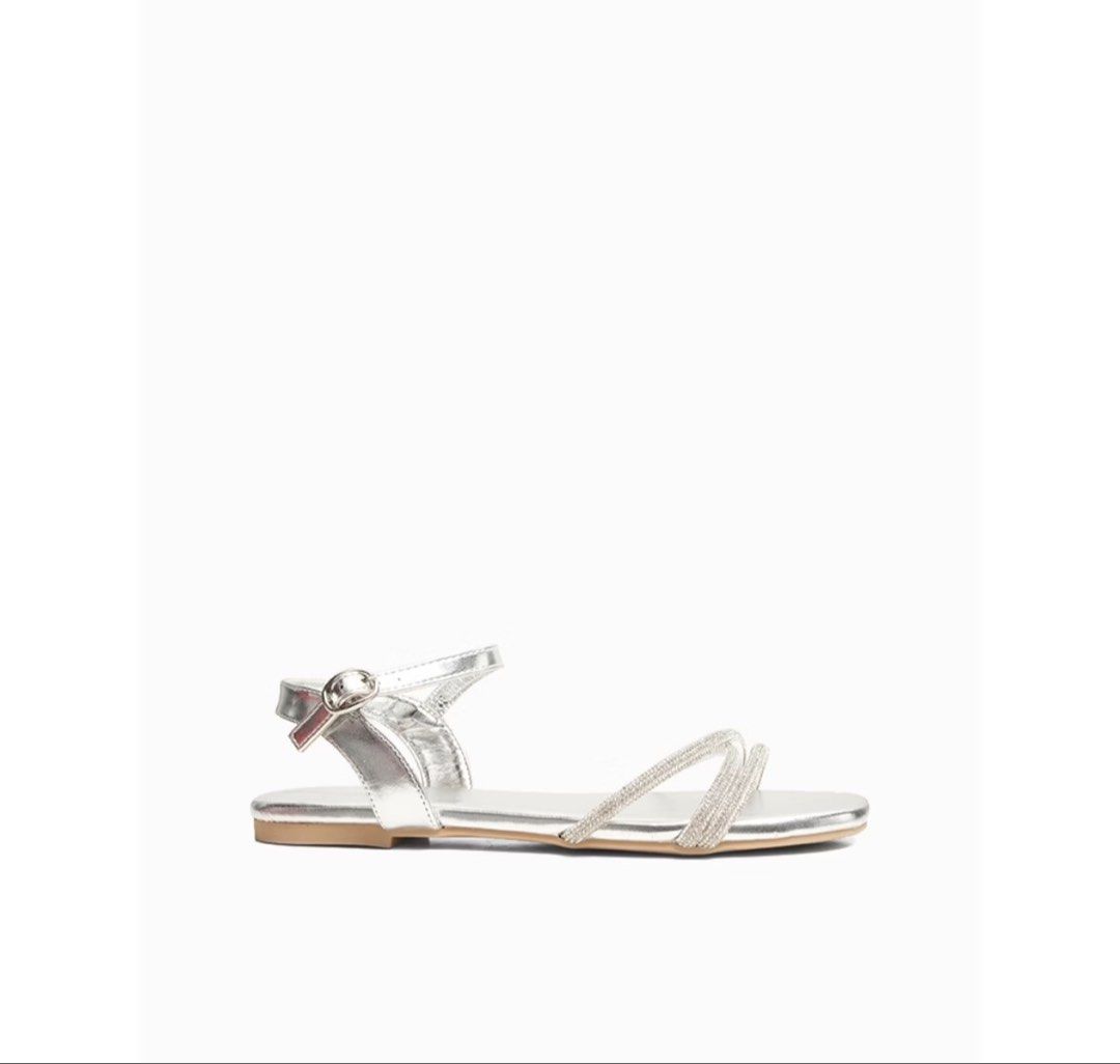 CLN silver flat sandal strapped sandal (Category: Sandals) located in Anda. Submitted by disaccharide (Listing ID 1462055660, Image 2). Description: once used - attended wedding best fit size 7 women.
